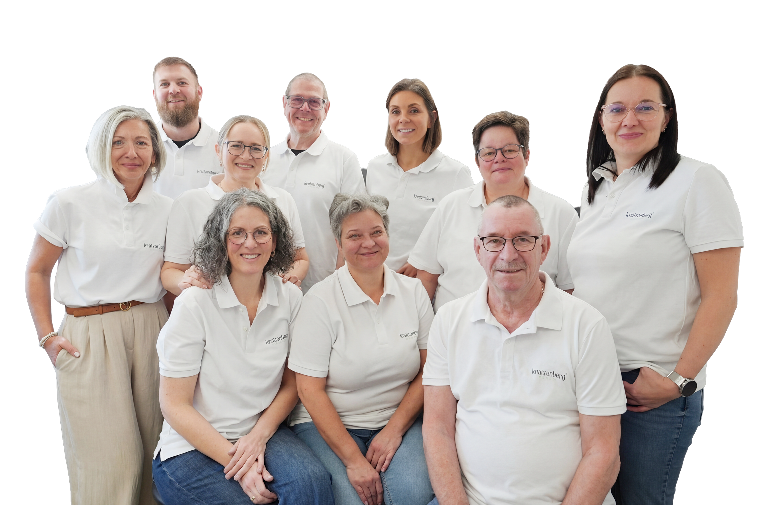 Team des Dentallabors in weißen Poloshirts